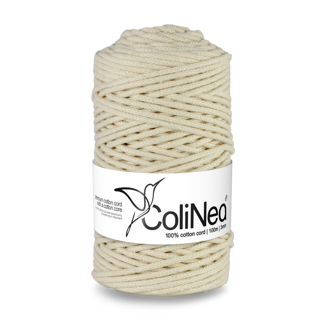 ColiNea presents a braided cotton cord with a cotton core, 3mm thick and 100m long, in a classic ivory hue. Perfect for crafting projects, offering durability and timeless elegance.