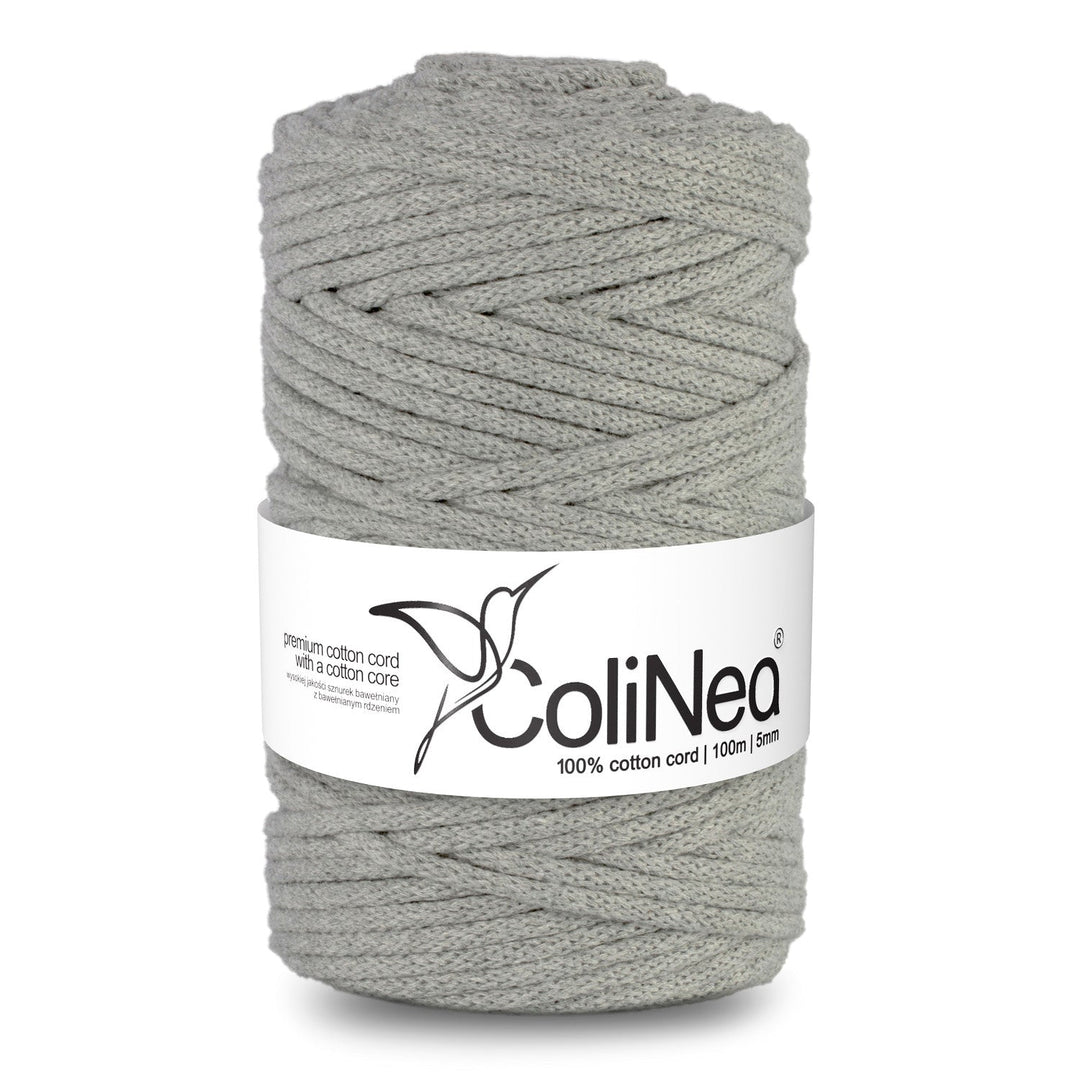 ColiNea's braided cotton cord with a cotton core. This 5mm cord, spanning 100m, comes in a stylish grey hue, combining durability with modern elegance.